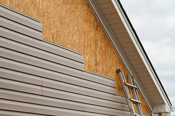 Professional Vinyl Siding technician working in Fredonia, NY